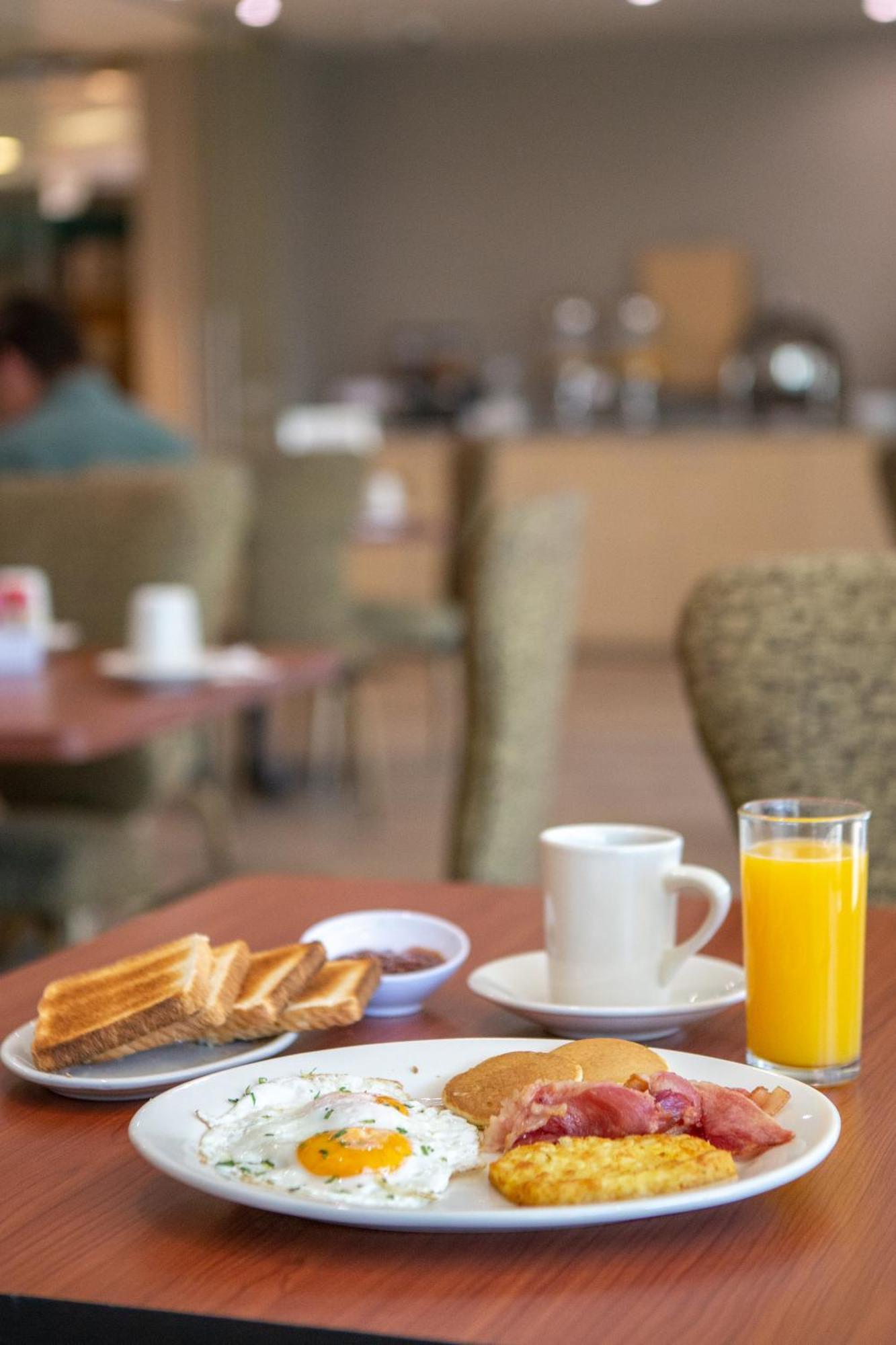 La Joya Pachuca Hotel Eksteriør billede A breakfast with orange juice